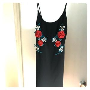 Black dress with red flower design